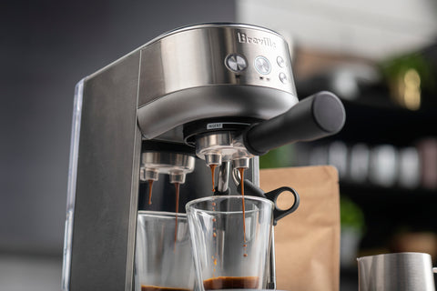 The Bambino Espresso Machine pouring a coffee shot