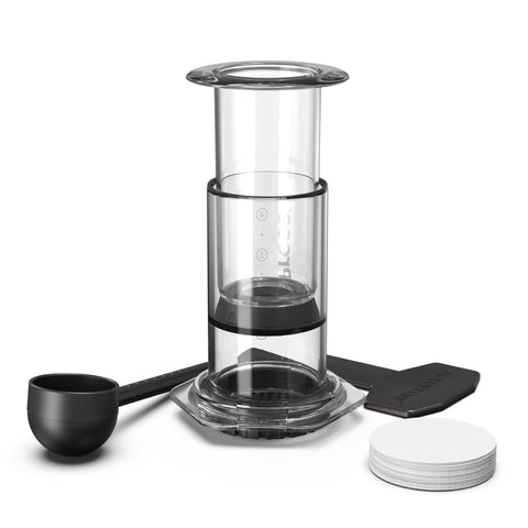 Clear coffee maker with black accents on a white background
