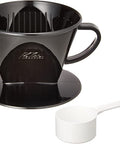 Kalita Plastic Black coffee dripper and white measuring spoon on a white background