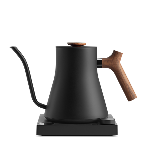 Black electric kettle with wooden handle on a white background