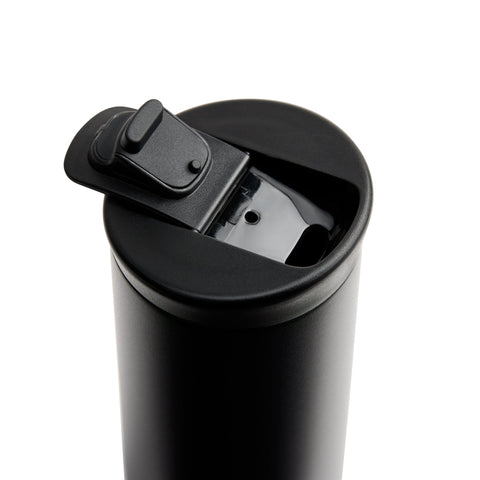 Black travel mug with a flip lid on a white background