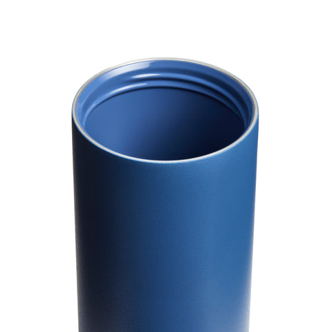 Blue tumbler on a white background
