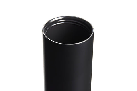 Black cylindrical object on a white background