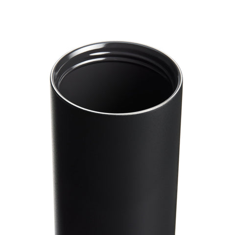 Black tumbler with a silver rim on a white background