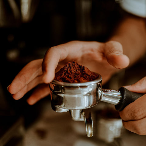 coffee grounds in a pourta filter 