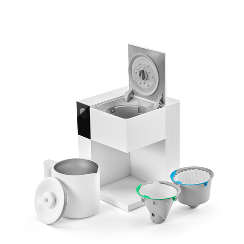 Fellow Aiden White coffee filter holder with multiple filters on a white background