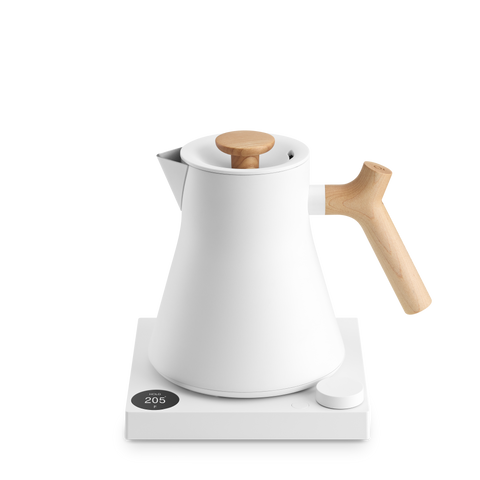 Fellow Corvo EKG Pro Electric Kettle White electric kettle with wooden handle and spout on a white background