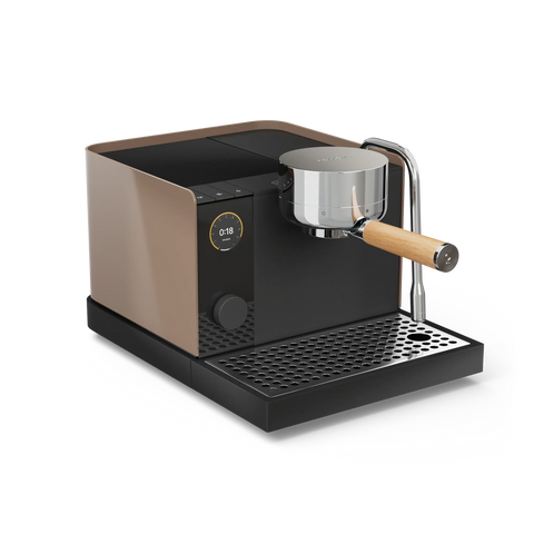 Fellow Series 1 Espresso machine with a milk frothing attachment on a white background