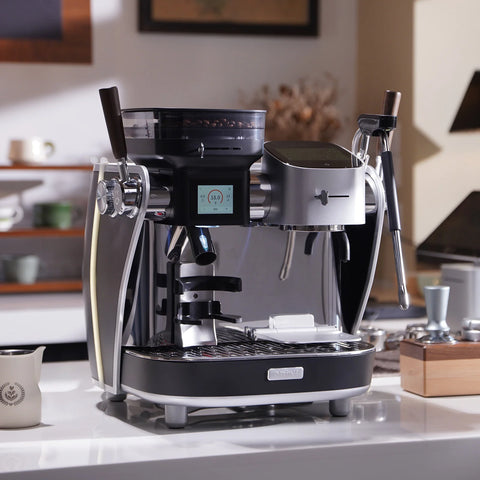 Maxim La Seine Black and silver espresso machine on a kitchen counter with blurred background