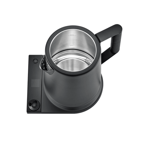 Black electric kettle with a stainless steel interior on a transparent background