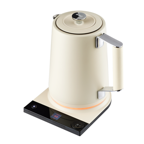 Cream-colored electric kettle with digital display on a white background