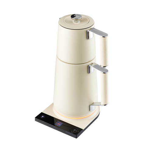 Cream-colored electric kettle on a white background