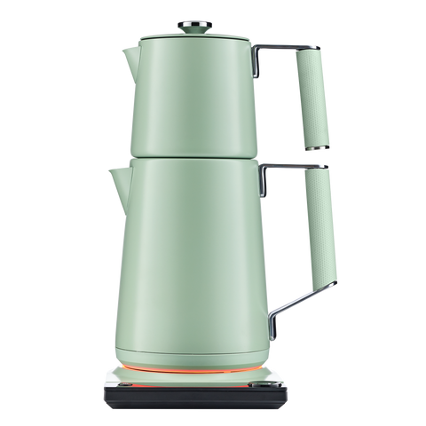Light green electric kettle on a white background