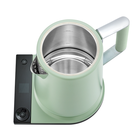 Mint green electric kettle with a digital display on a white background