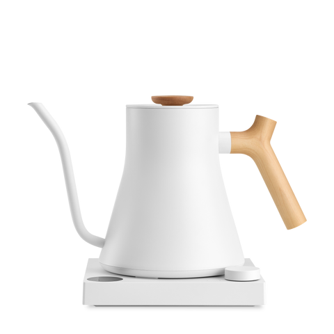 White electric kettle with wooden handle and spout on a white background