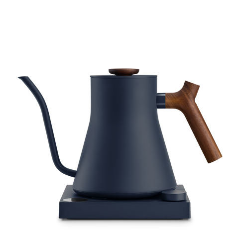 Blue electric kettle with a wooden handle on a white background