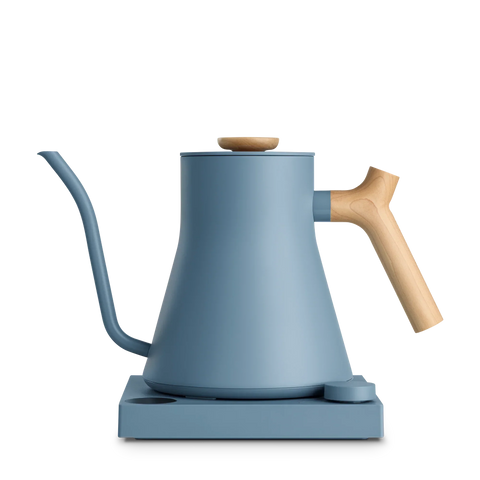 Blue electric kettle with wooden handle on a white background
