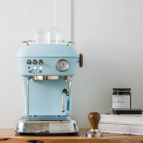 Ascaso Dream PID Automatic Home Espresso Machine - Kid Blue  on a wooden surface with a white background