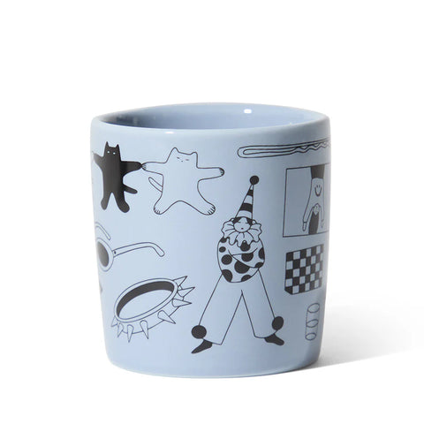Katya Krasnova for notNeutral Light blue mug with black and white illustrations on a white background