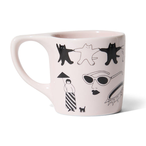 White mug with black and white illustrations of cats and people on a white background