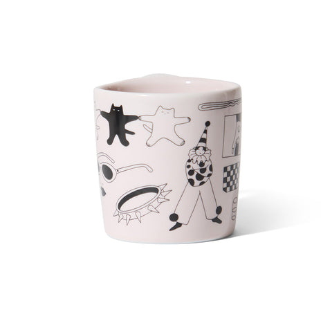 Ceramic mug with black and white illustrations on a white background
