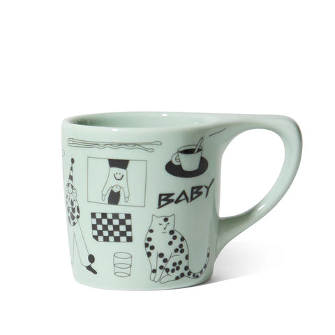 Katya Krasnova for notNeutral Light green mug with black illustrations and the word 'BABY' on a white background