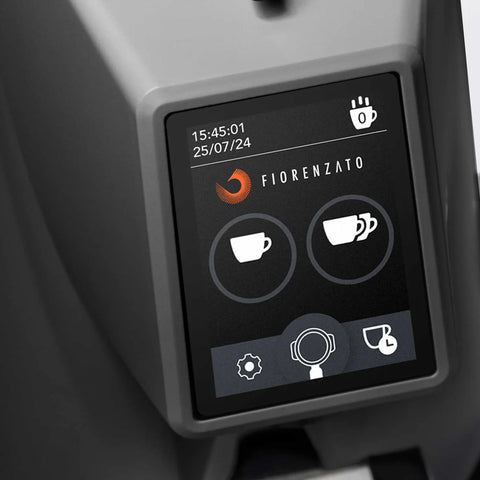 Fiorenzato F4 Evo On-Demand Espresso Grinder Digital display on a coffee machine with Fiorenzato branding and time, date, and cup icons.