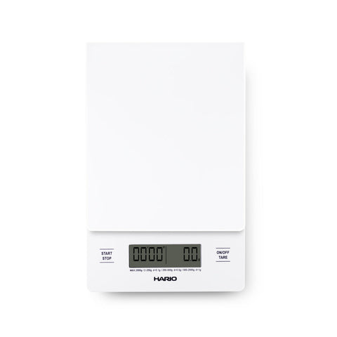 Digital kitchen scale with a white background