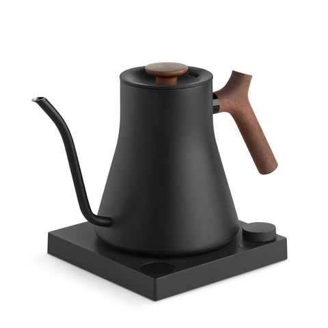 Fellow Stagg EKG Pro Electric Kettle - Matte Black w/ Walnut with wooden handle and spout on a white background