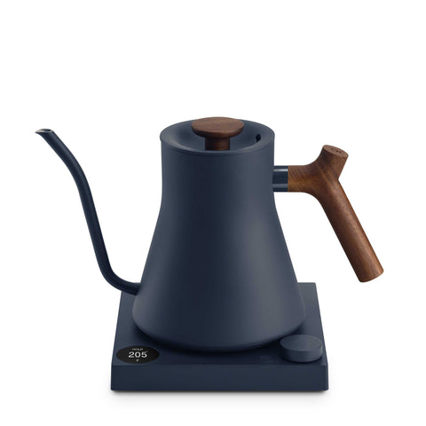 Fellow Stagg EKG Pro Electric Kettle - Stone Blue w/ Walnut with wooden handle and spout on a white background