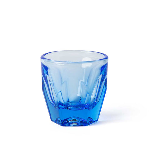 Blue glass tumbler on a white background