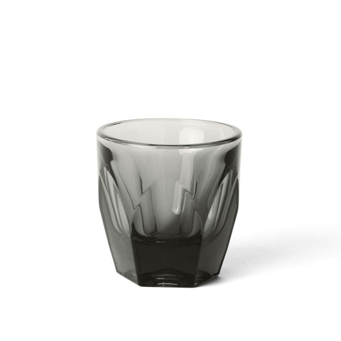 Smoky gray glass tumbler on a white background