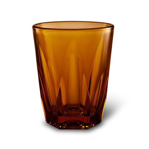 Brown glass tumbler on a white background